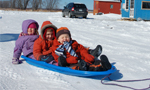 Children on a sled in winter