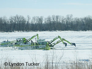 Three amphibian ice breakers on the Red River near Breezy Point, Manitoba. March 2011. © Lyndon Tucker. 