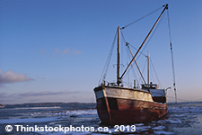 Fishing Ship surrounded by icy water