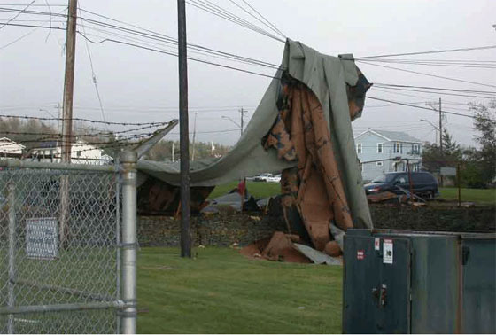 Power outages were also caused by roofing material landing on power lines. Photo: Doug Mercer
